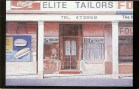 17. John Kramer - Elite Tailors - used 9x14cm (Small)